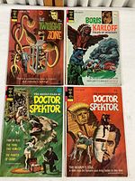 Photo showing front covers of four vintage Gold Key comic books against a neutral background: The Twilight Zone No. 47 (1972), Doctor Spektor No. 2 and No. 3 (1973), and Boris Karloff Tales of Mystery No. 50 (1973).
