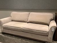 Front elevation of full couch showing overall style and condition
