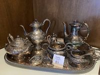 Full view of entire tea and coffee service on tray