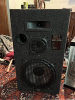 Front view of 8812 Linear Phase Studio Monitor loudspeaker showing speaker driver layout and port.