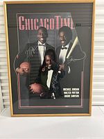 Framed Chicago Time magazine poster with Michael Jordan, Walter Payton and Andre Dawson in tuxedos, holding sports equipment and autographed.