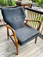 Front left three-quarter view of chair on porch