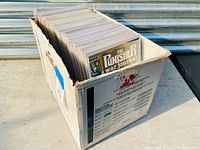 Box of bagged and boarded vintage comics showing Marvel The Punisher: War Journal at front