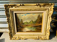 Full view of the framed signed oil painting by Adams showing overall condition and artistic details