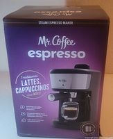 Box showing Mr. Coffee Espresso Maker label, highlighting traditional lattes, cappuccinos, and espresso making.