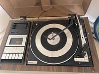 Top view of Fisher DJU-17 turntable showing platter, tonearm, and controls