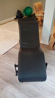 Front view showing overall shape and leather upholstery