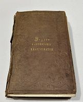 Front cover of Alexis Soyer's Gastronomic Regenerator cookbook, brown cloth with gilt lettering, showing wear and detached cover.