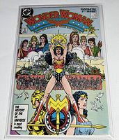 Full front cover of the Wonder Woman #1 1987 2nd series comic book showing Wonder Woman standing tall with the background of Paradise Island and Amazons.
