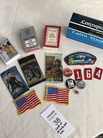 Overview of all items including trading cards, patch badges, and pin buttons.