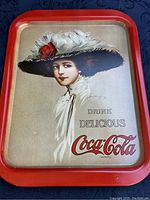 Front side showing full design of Coca-Cola vintage serving tray with woman in hat figure and logo.