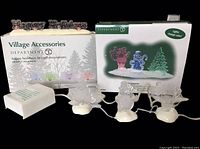 Set displayed with original packaging, includes lit acrylic holiday yard decorations and battery pack.
