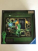 Front view of the closed box showing Disney Villainous Maleficent puzzle with 1000 pieces with collectible piece image.