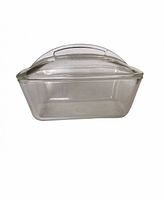 Front angle view of glass loaf pan with lid on
