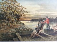Close-up of lithograph showing two people on a dock by the lake at sunset with a dog, trees, and water scene