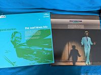 Front covers of Earl Hines Trio and Billy Eckstine vinyl records showing album artwork and titles.