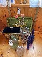 Photo of the entire grouped lot showing TV tray, blue bottles, clear vase and jug, glass cover.