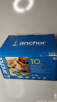 Photo of blue Anchor Hocking 10-piece bake set box showing brand name, product name and partial product images