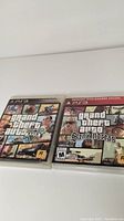 Photo showing both Grand Theft Auto V and Grand Theft Auto San Andreas PS3 game cases.