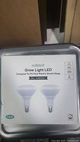 Box front showing brand Adishio Grow Light LED, image of two BR30 LED bulbs, key specs such as 12 watts, 1500 lumens, 3000K color temperature, CRI 75, and SKU HG8R30A1