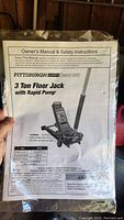 Owner's manual and safety instructions showing product information and brand name.