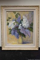 Framed painting showing full artwork with white and purple lilacs in vase.