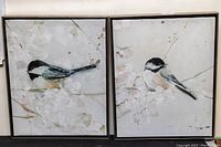 Two framed stretched canvas bird prints side by side, showing full artwork and frames.