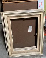 Two images showing various beige to off-white picture frames with no glass. Frames include plain and ornately decorated styles with gold accents on some corners.