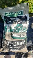 Front view of a full bag of Alltreat Farms decorative landscape peastone with brand and product label visible.