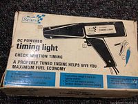 Original Sears box for DC powered timing light with text and graphics.