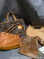 Four bags included in the lot together showing variety of sizes and colors