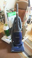 Three vacuum cleaners and cleaning equipment with no relation to the lot.