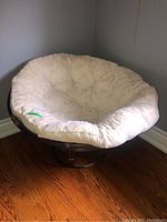 Full view of papasan chair and cushion at angle