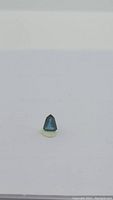 Gemstone upright on white background, full shape visible