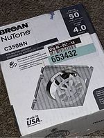 Box front showing product image, brand, and specifications including airflow at 50 CFM and noise at 4.0 sones