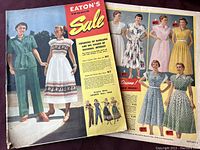 Front covers of two Eaton's catalogs from 1949 and 1950 featuring vintage women's fashion illustrations and photos.