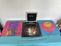 Three vinyl albums laid flat showing covers: two by The 5th Dimension and one Hair soundtrack