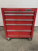 Front view of red Waterloo tool box with 5 drawers and Waterloo logo on the top right.