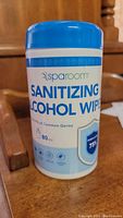 Front view of Sparoom Sanitizing Alcohol Wipes bottle showing brand and product information with 80 pieces per container.