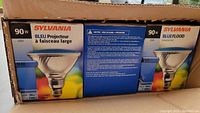Box of six 90 watt Sylvania blue halogen floodlight bulbs with PAR38 medium ski base.