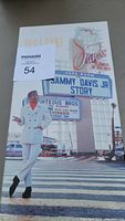 Front cover of the box set showing Sammy Davis Jr. in a white suit walking down a street with a sign for 'Sammy Davis Jr. Story'.