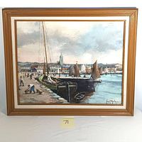 Full view of the framed oil painting depicting fishing boats docked at a harbor with people on the pier and a cloudy sky.