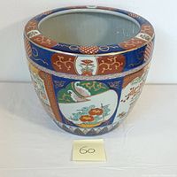 Front view of large Imari style planter showing overall decoration and condition