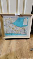 Framed 1959 map showing entire map and frame.