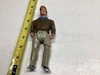 Photo of Murdock action figure showing full body and height reference with tape measure