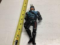 Sectaurs Zak 1984 action figure next to measuring tape showing about 6 inches tall.