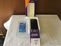 Alcatel 1B smartphone box and packaging including ChatR Mobile branding and phone manual insert