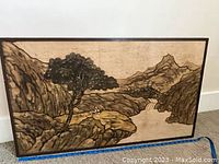 Full view of Japanese landscape art on wood, showing the tree, mountains, waterfall, and seated figure in a 2 inch thick wood frame.