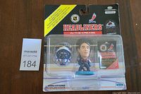 Front view of Patrick Roy bobblehead figure in original package with visible packaging wear.