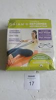 Box front and top showing Gaiam CorePlus Reformer boxed product with image of woman exercising and key features.